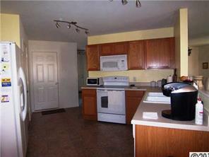 2239 Durand Road Fort Mill, SC 29715 - Photo 6 of 13 a kitchen with a refrigerator and a stove top oven