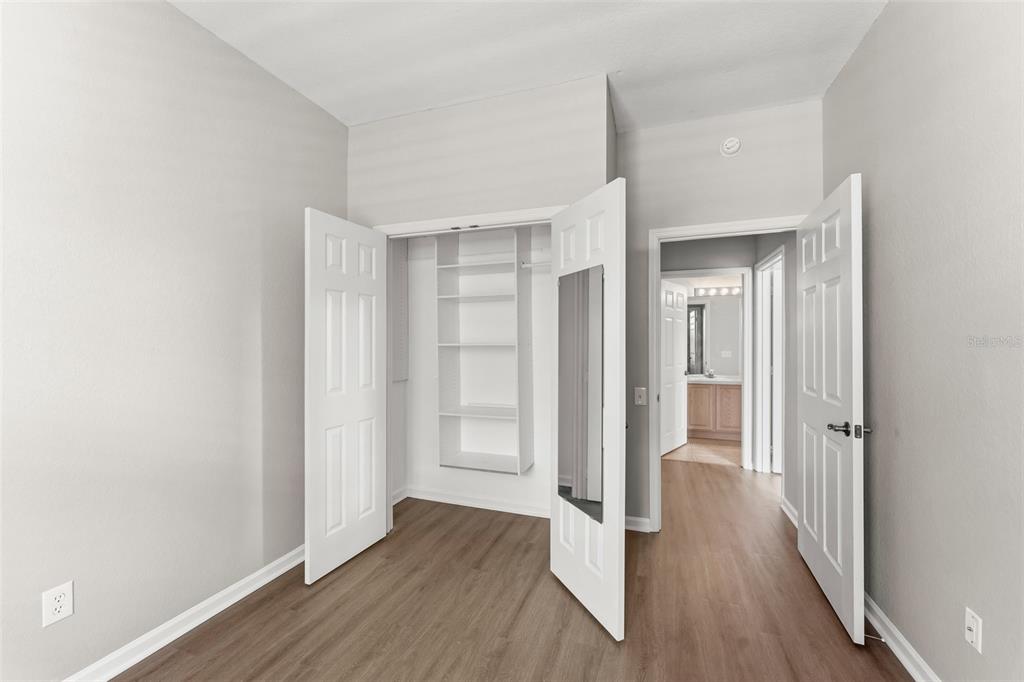 1224 South Hiawassee Road, Unit 636 Orlando, FL 32835 - Photo 24 of 43 a view of wooden floor in a room