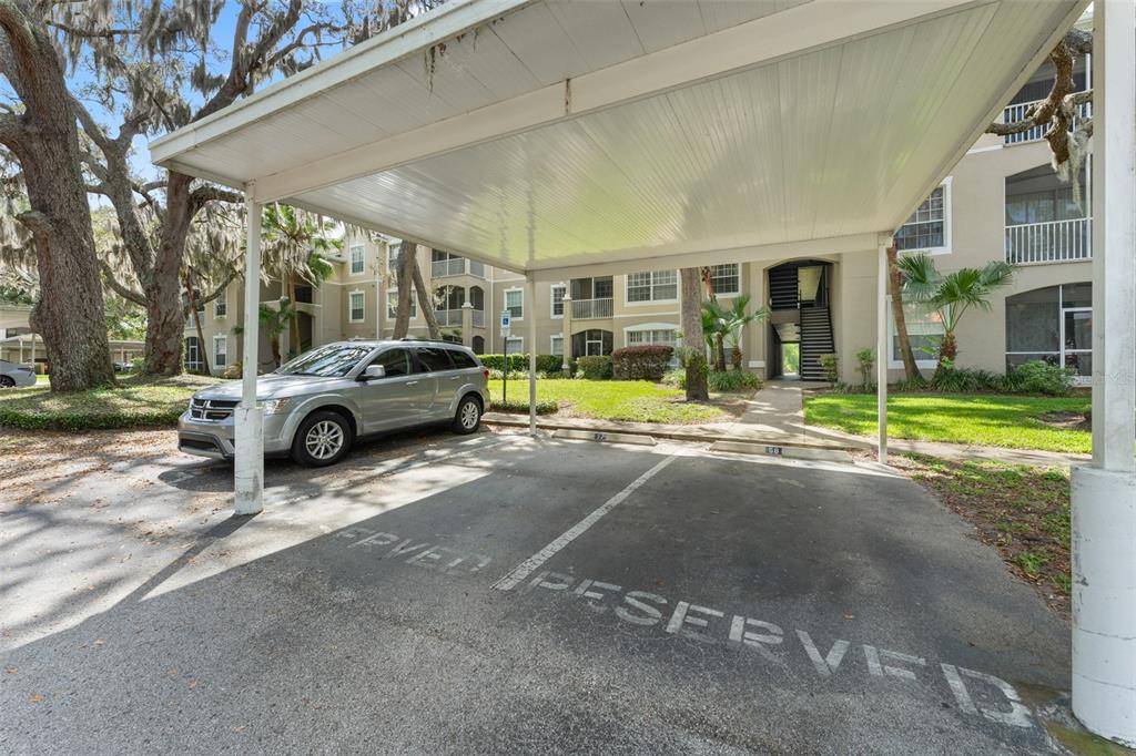 1224 South Hiawassee Road, Unit 636 Orlando, FL 32835 - Photo 37 of 43 a car parked in front of a building