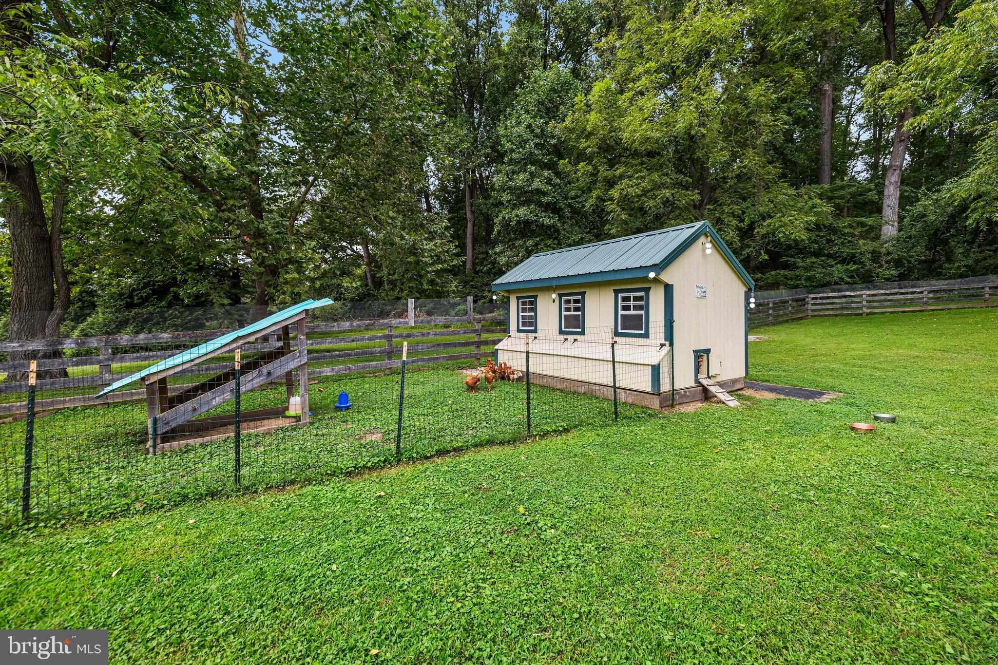 14921 Tanyard Road Sparks Glencoe, MD 21152 - Photo 141 of 150 a view of a house with a backyard and a small park