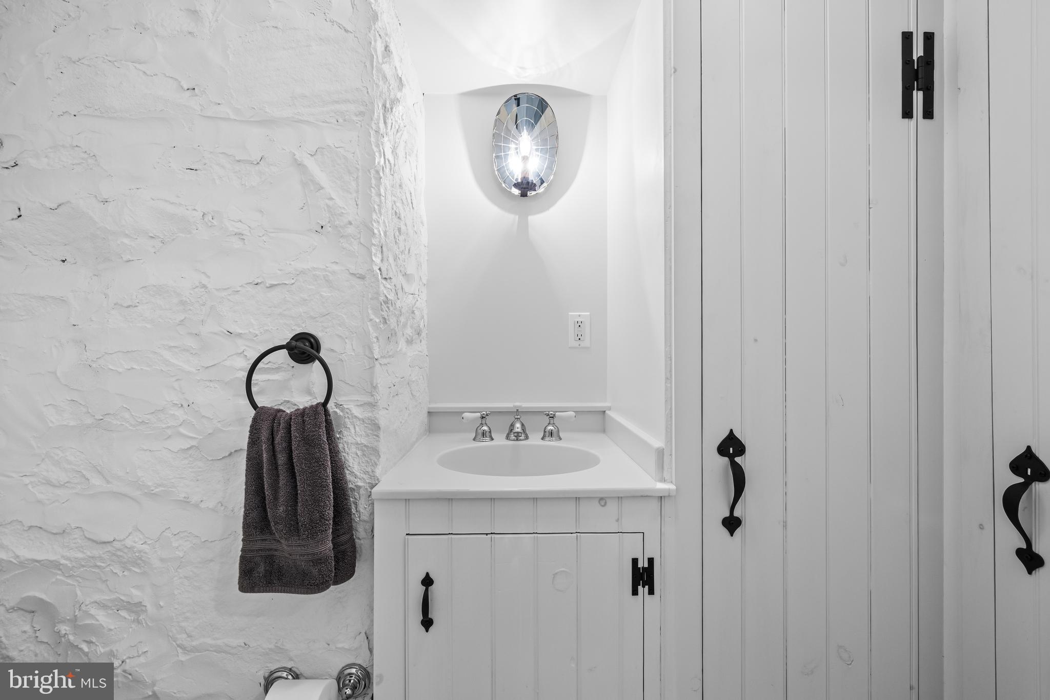 14921 Tanyard Road Sparks Glencoe, MD 21152 - Photo 51 of 150 a bathroom with a sink a mirror and shower