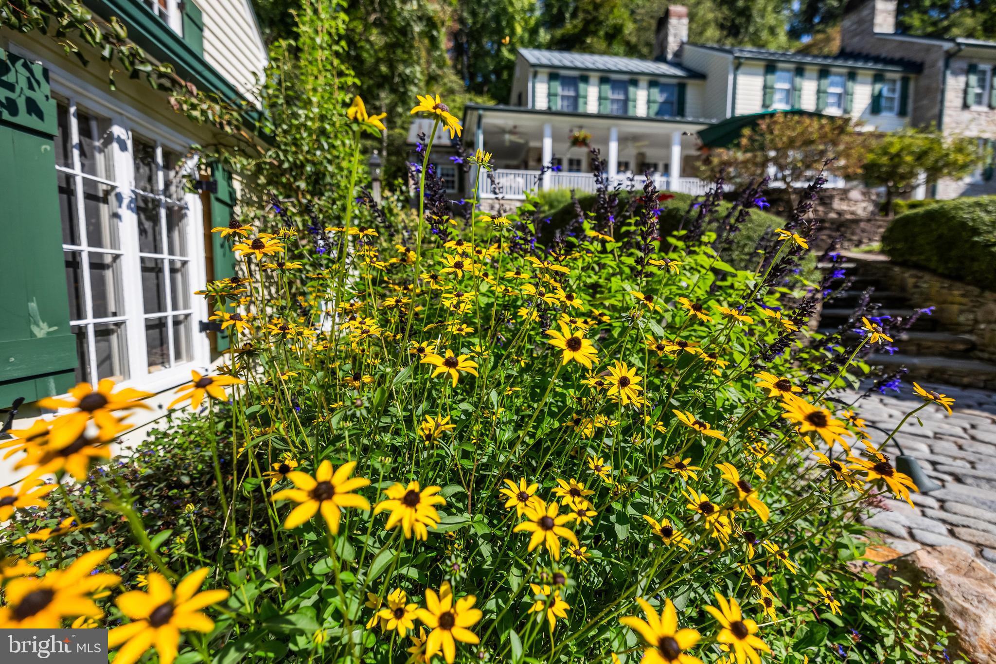 14921 Tanyard Road Sparks Glencoe, MD 21152 - Photo 62 of 150 a view of a brick building next to a yard
