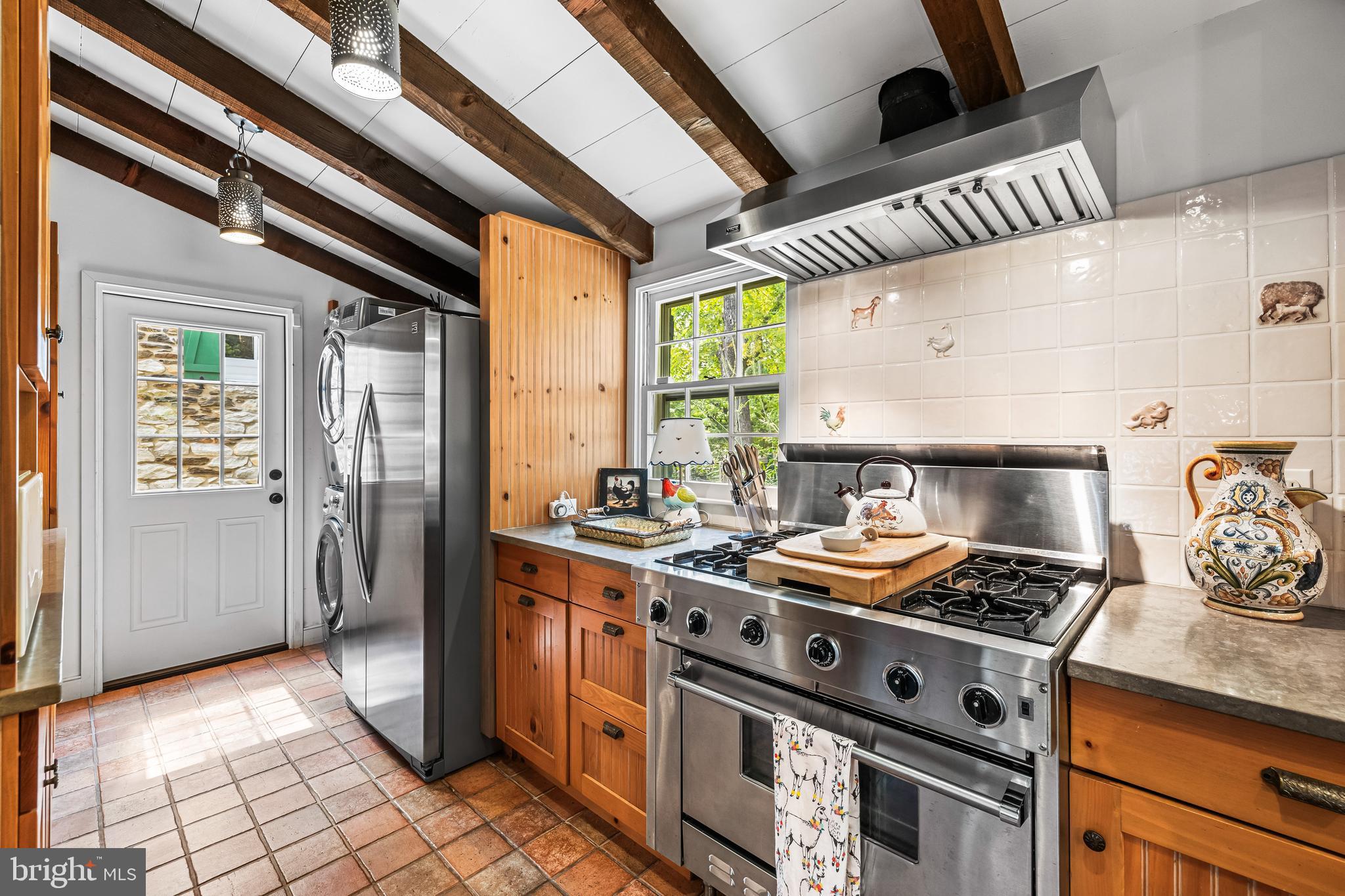 14921 Tanyard Road Sparks Glencoe, MD 21152 - Photo 75 of 150 a kitchen with a stove and a refrigerator
