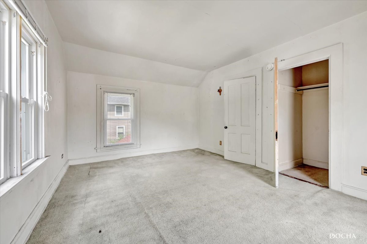 321 Fulton Street West Chicago, IL 60185 - Photo 13 of 21 an empty room with windows and closet