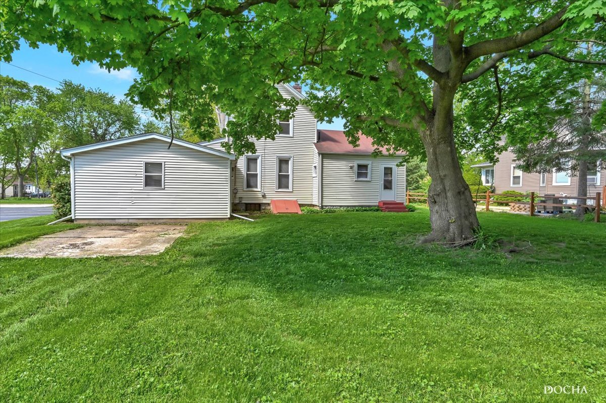 321 Fulton Street West Chicago, IL 60185 - Photo 18 of 21 a front view of house with yard and green space