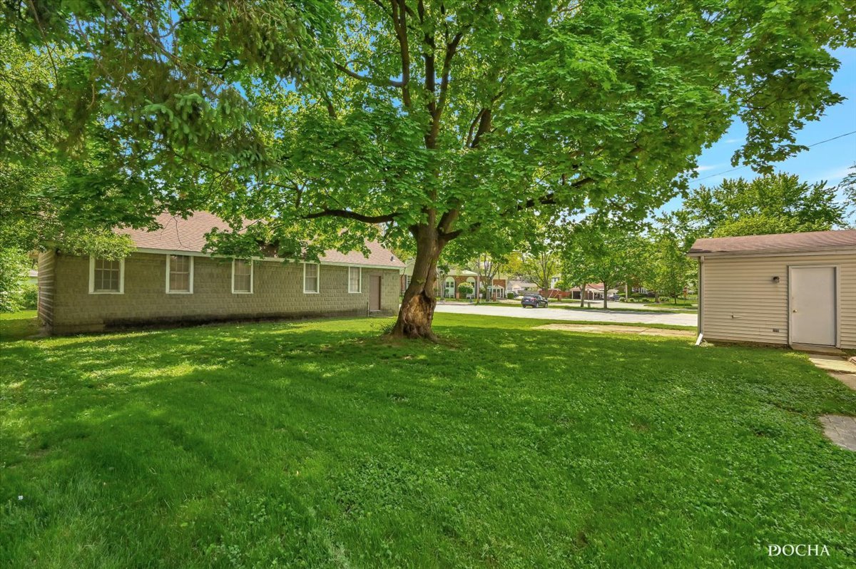 321 Fulton Street West Chicago, IL 60185 - Photo 2 of 21 a view of a house with a backyard