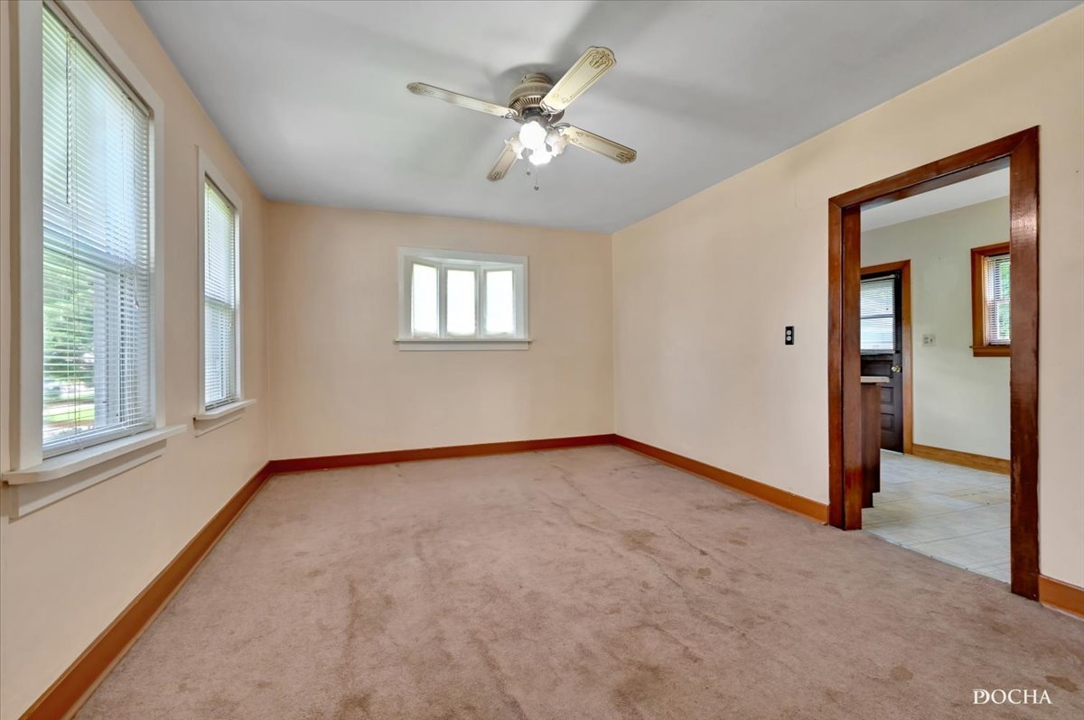 321 Fulton Street West Chicago, IL 60185 - Photo 5 of 21 a view of an empty room with a window