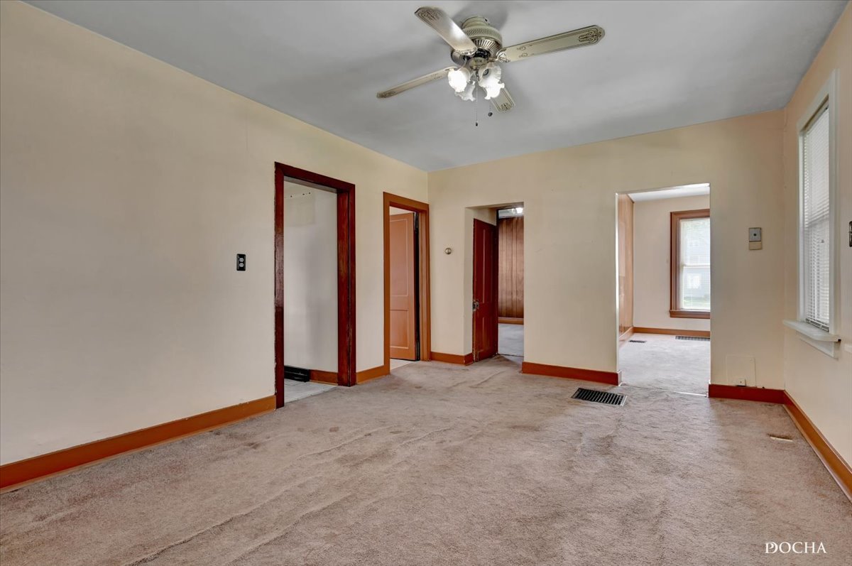 321 Fulton Street West Chicago, IL 60185 - Photo 9 of 21 wooden floor in an empty room with a window