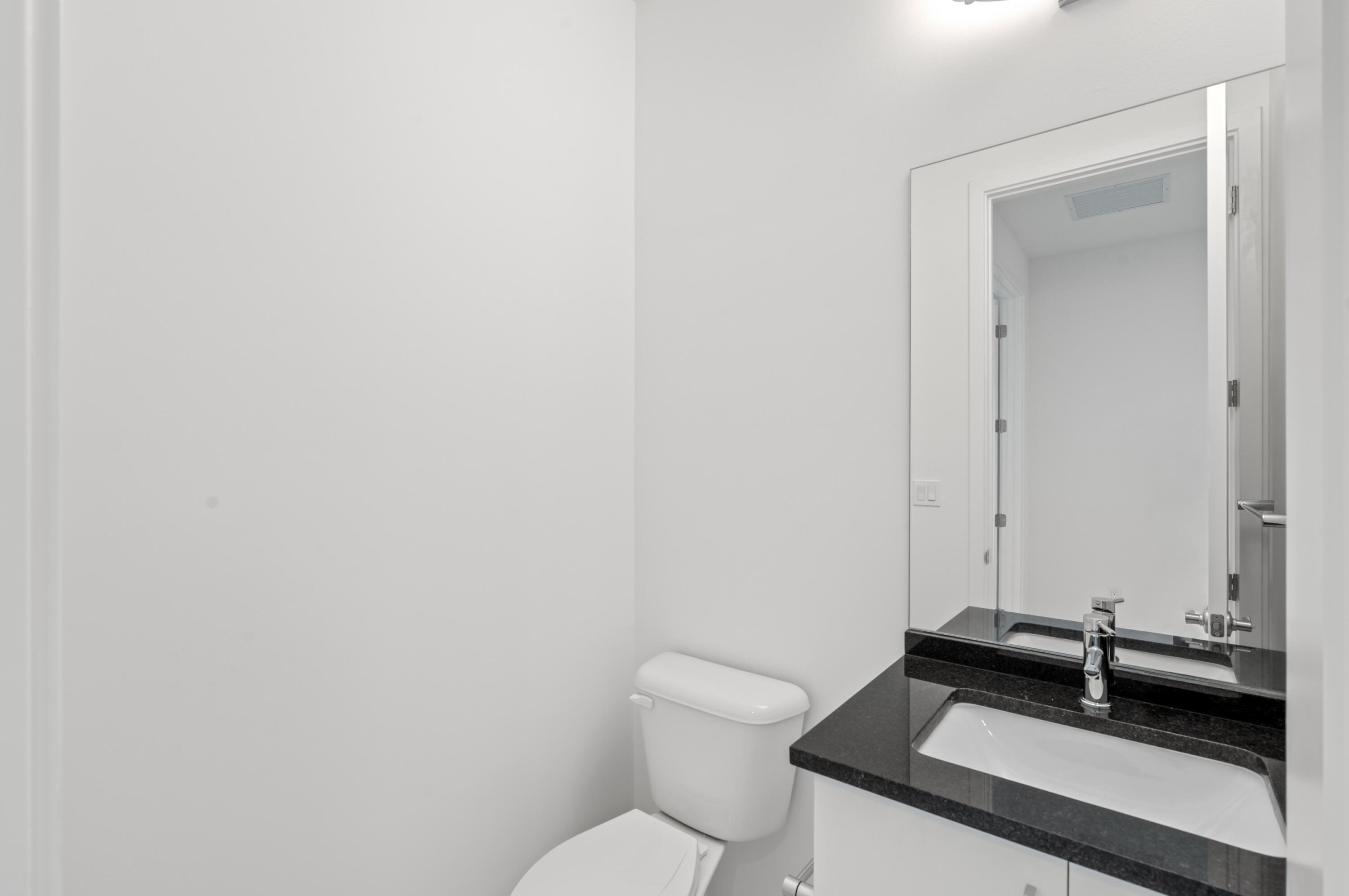 8539 Ganton Drive Boca Raton, FL 33434 - Photo 30 of 49 Upstairs Powder Room