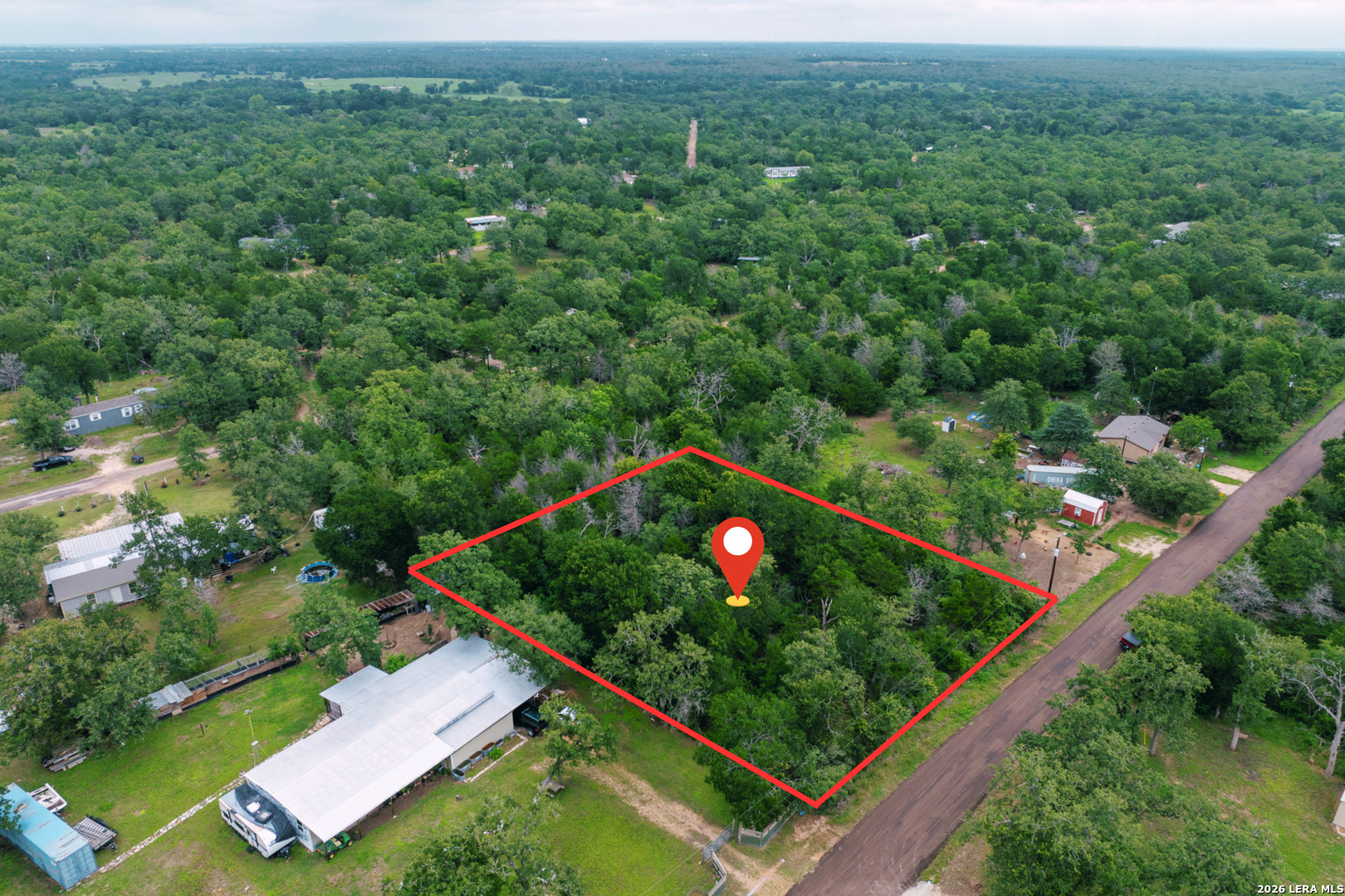 583 Blueberry Hill Road Somerville, TX 77879 - Photo 1 of 19 an aerial view of a pool and trees