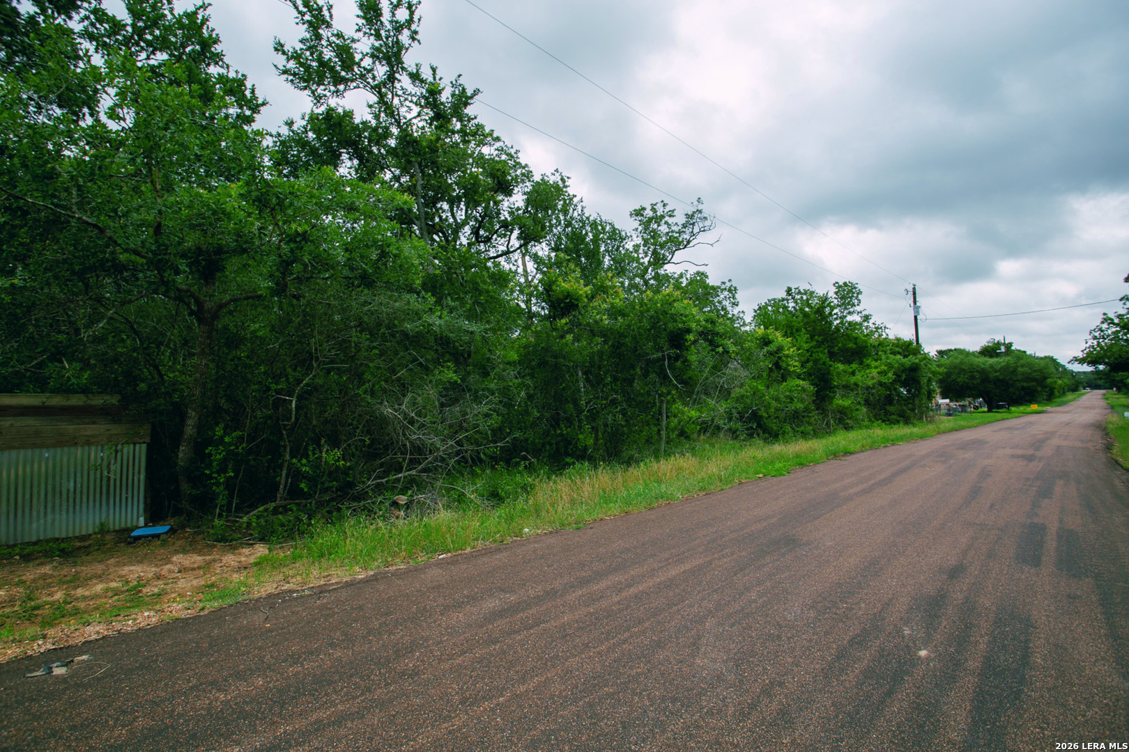 583 Blueberry Hill Road Somerville, TX 77879 - Photo 11 of 19 a view of a yard and basketball court