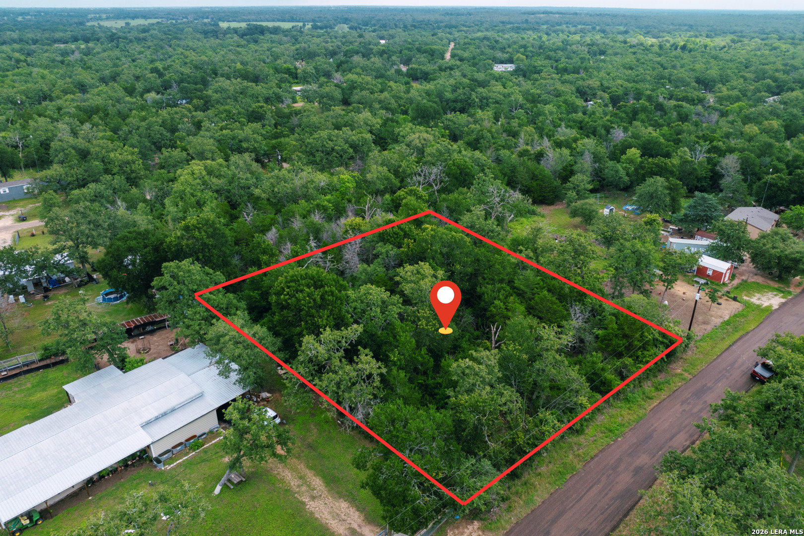583 Blueberry Hill Road Somerville, TX 77879 - Photo 2 of 19 a view of a tennis court