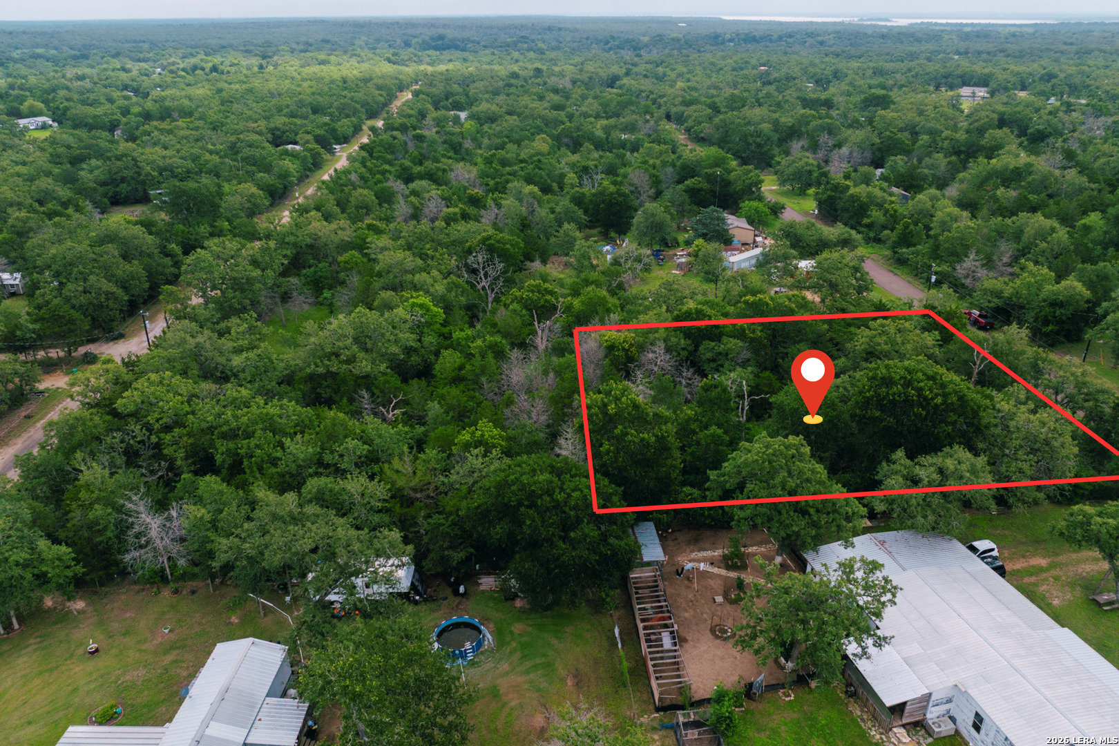 583 Blueberry Hill Road Somerville, TX 77879 - Photo 7 of 19 an aerial view of valley and swimming pool