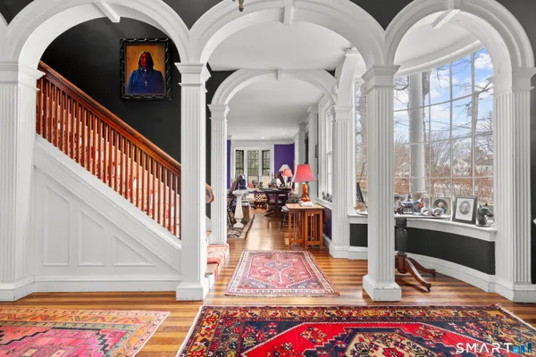 a view of living room with furniture and rug floor