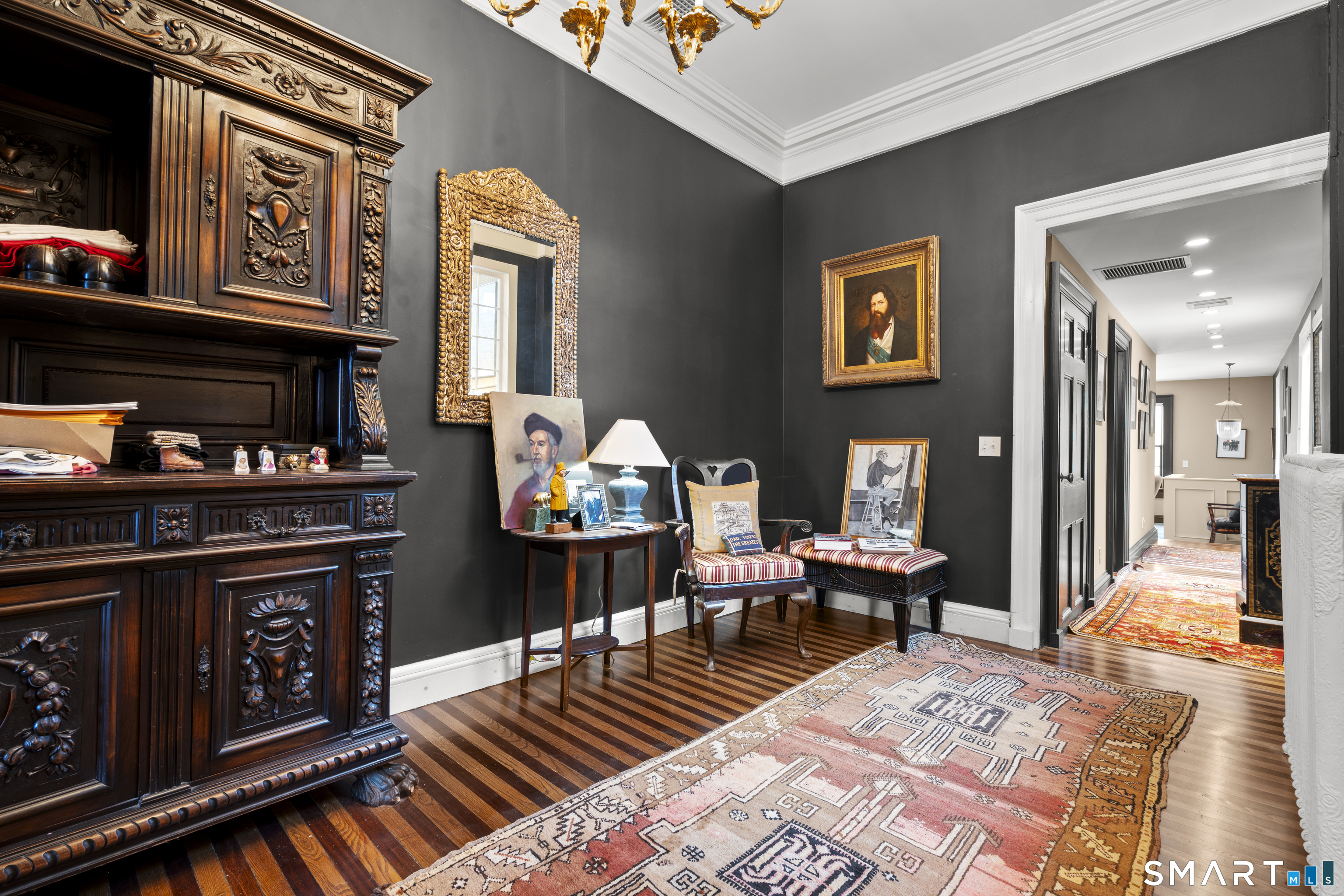 91 North Street Litchfield, CT 06759 - Photo 20 of 40 a living room with furniture and a fireplace