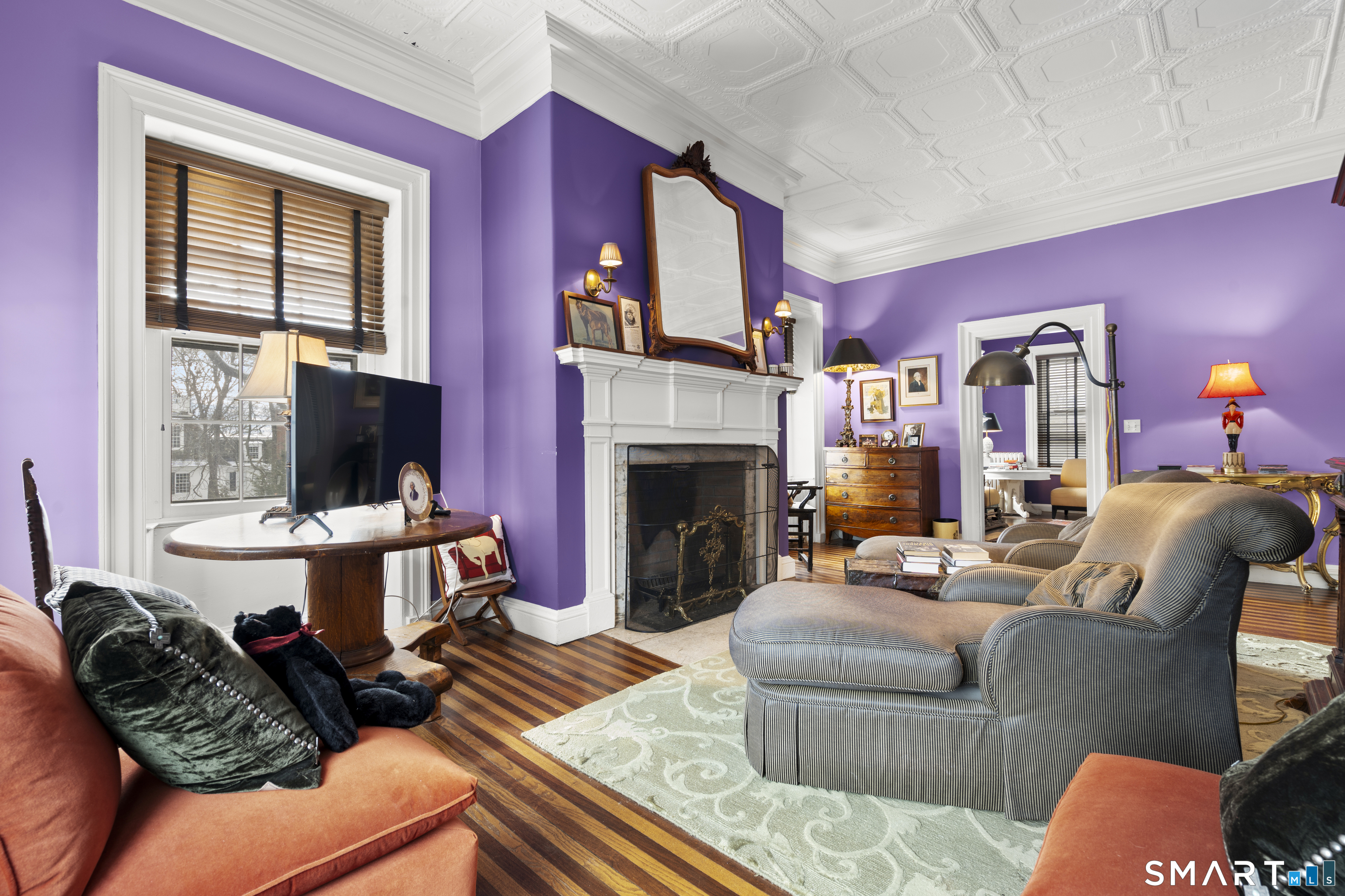 91 North Street Litchfield, CT 06759 - Photo 23 of 40 a living room with furniture fireplace and flat screen tv