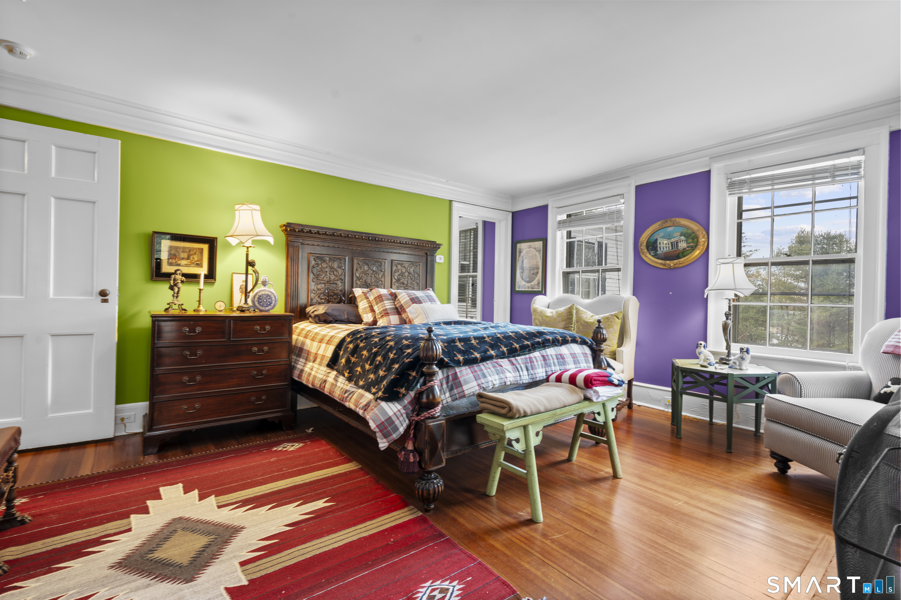 91 North Street Litchfield, CT 06759 - Photo 31 of 40 a bedroom with a bed and wooden floor