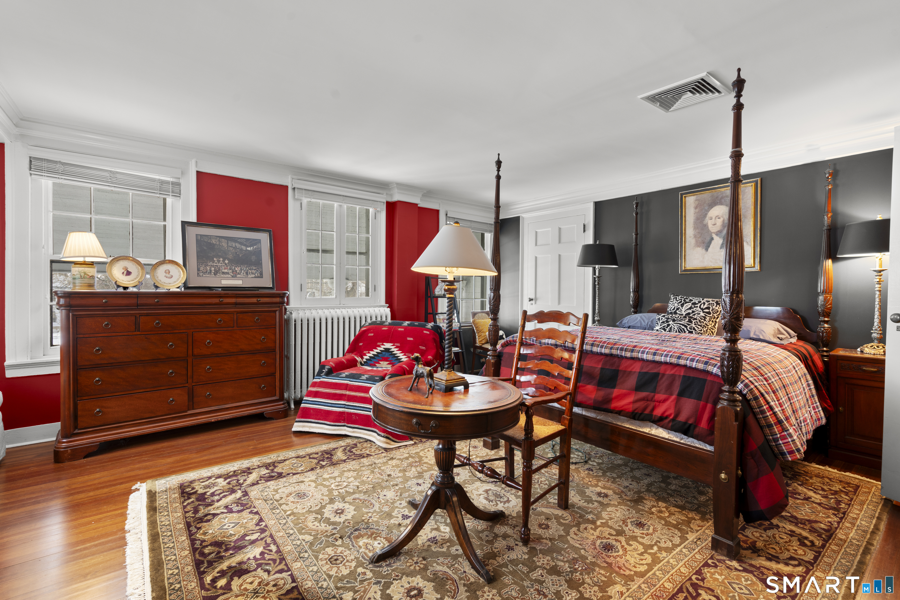 91 North Street Litchfield, CT 06759 - Photo 33 of 40 a living room with furniture and a rug