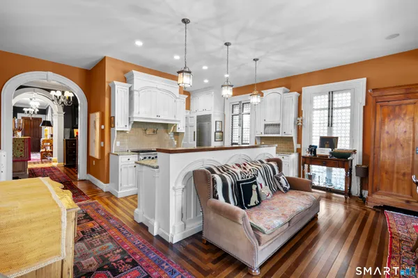 a very nice looking living room with a large window