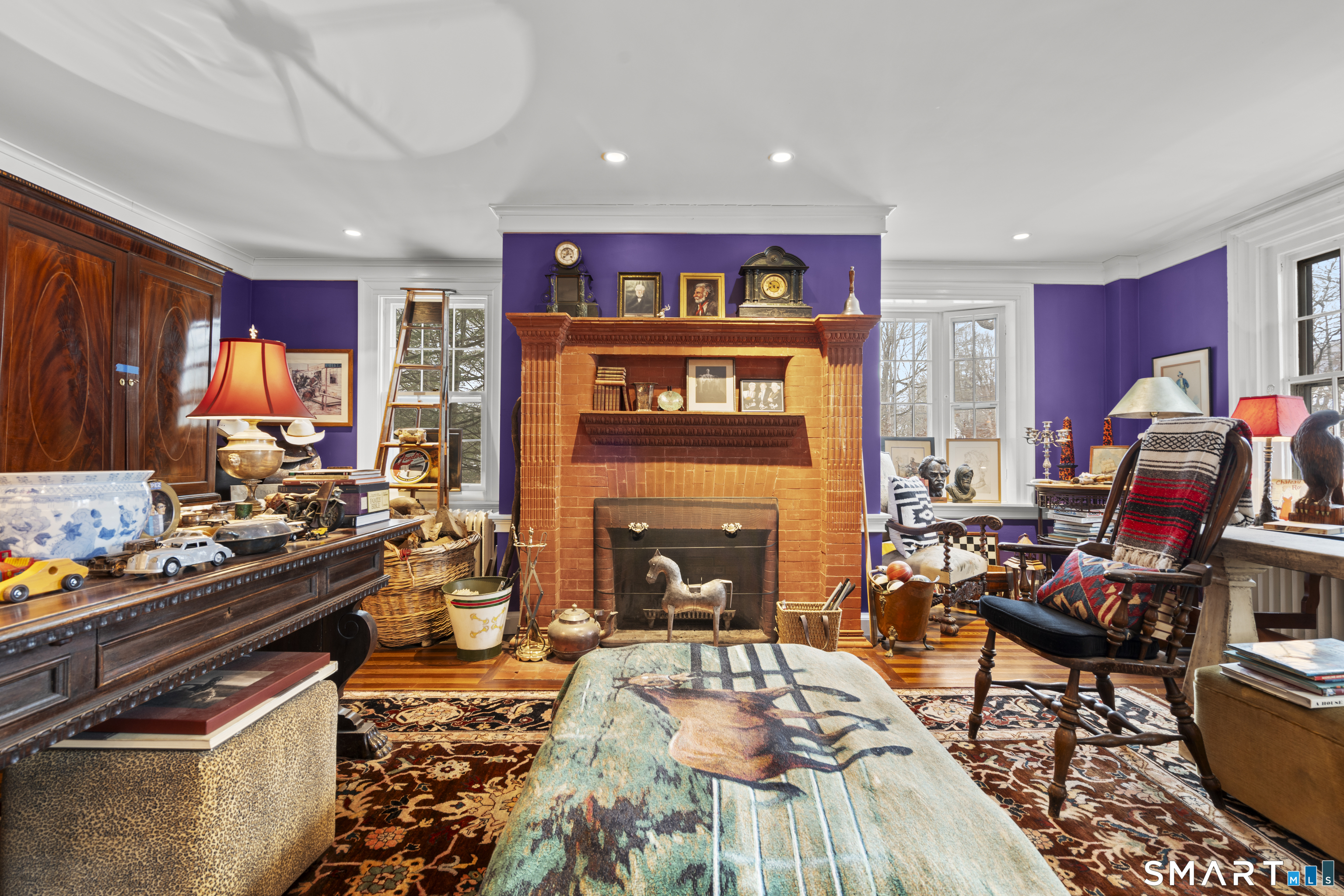 91 North Street Litchfield, CT 06759 - Photo 9 of 40 a living room with furniture fireplace and flat screen tv