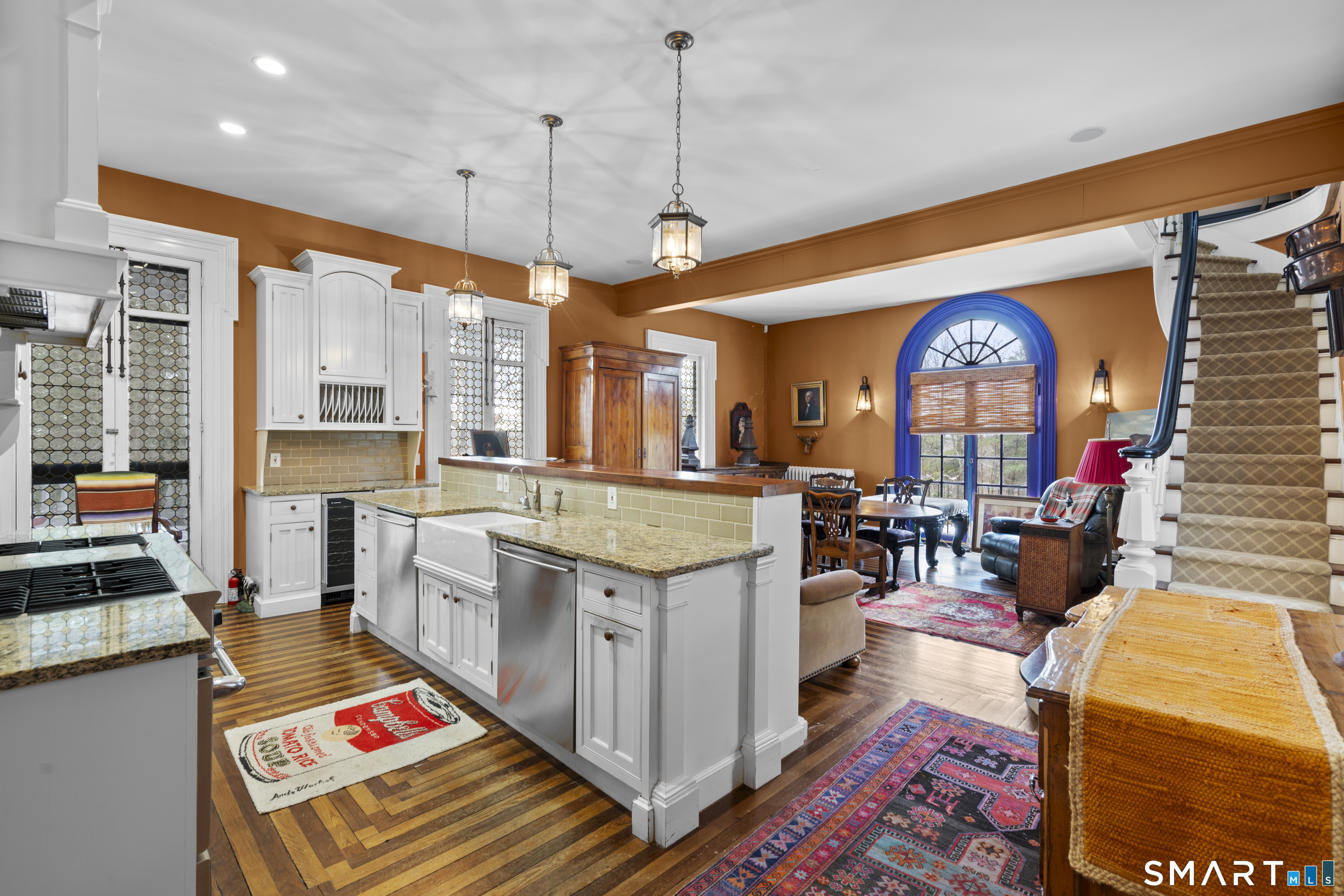 91 North Street Litchfield, CT 06759 - Photo 10 of 40 a very nice looking living room with a rug and a dining table