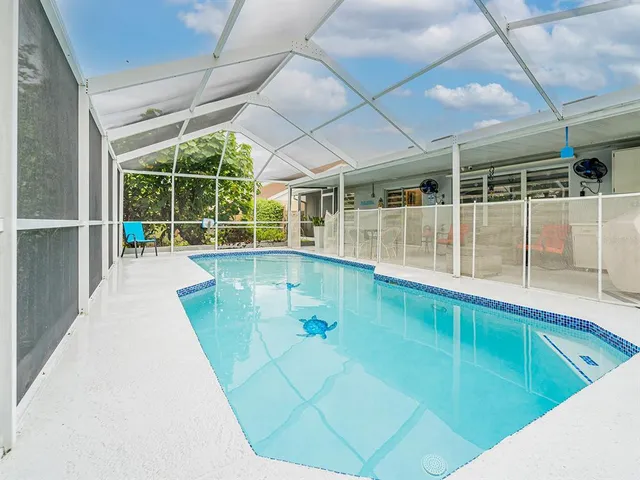 a view of a swimming pool with a porch