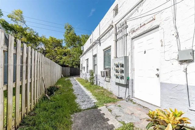 a view of a back yard of the house