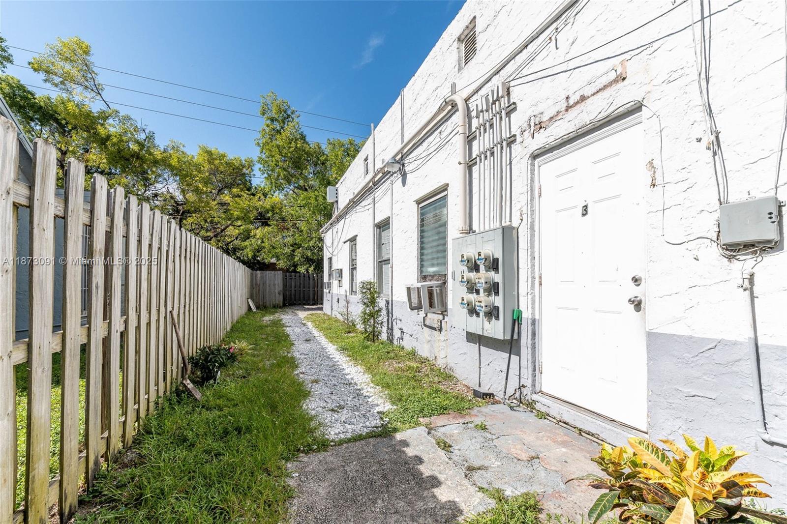 180 Northwest 59th Street Miami, FL 33127 - Photo 12 of 23 a view of a back yard of the house