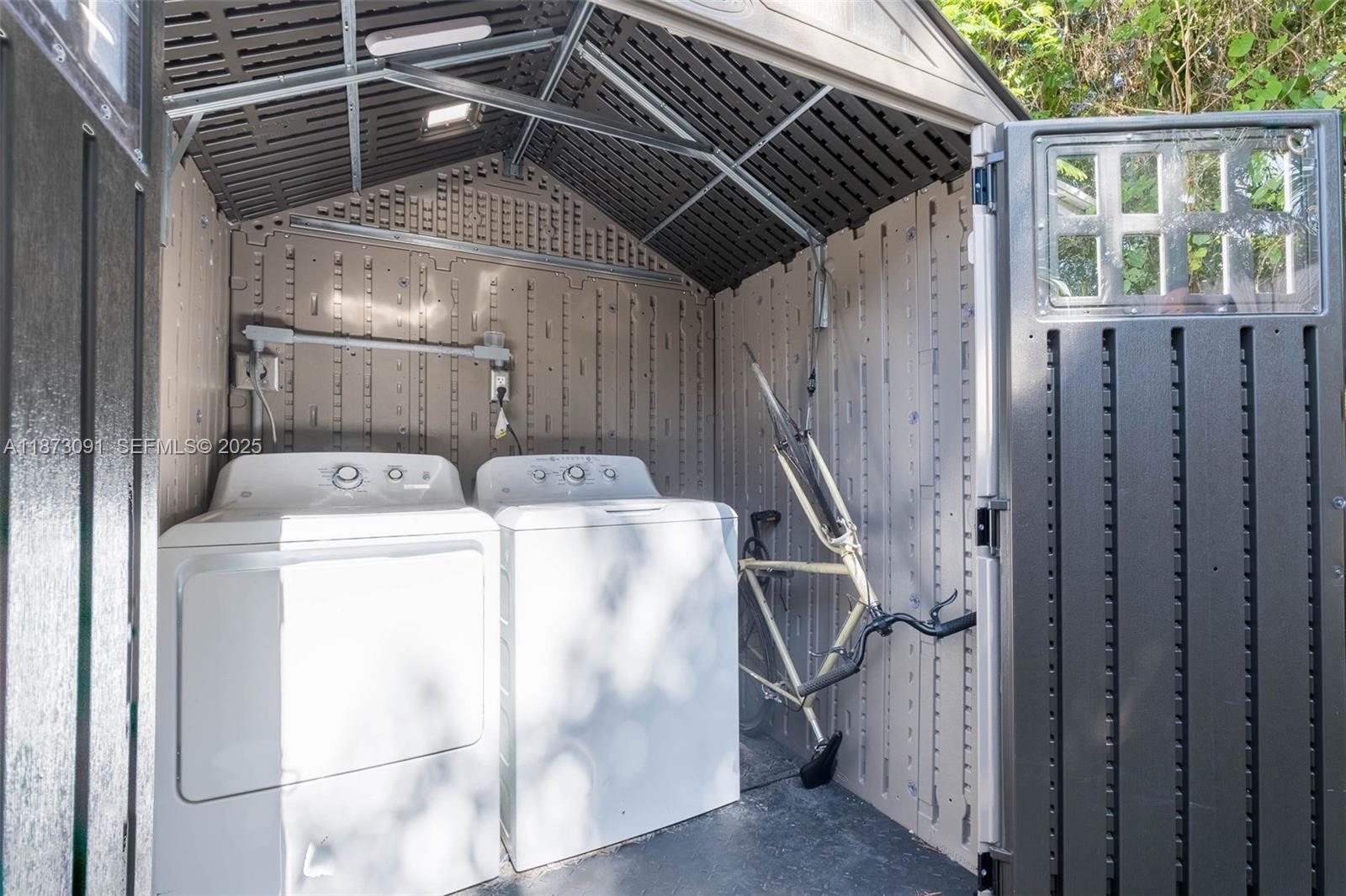 180 Northwest 59th Street Miami, FL 33127 - Photo 13 of 23 a utility room with dryer and washer
