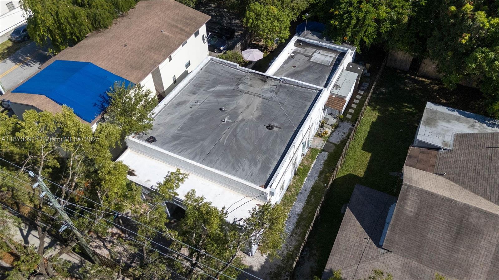 180 Northwest 59th Street Miami, FL 33127 - Photo 17 of 23 an aerial view of a house