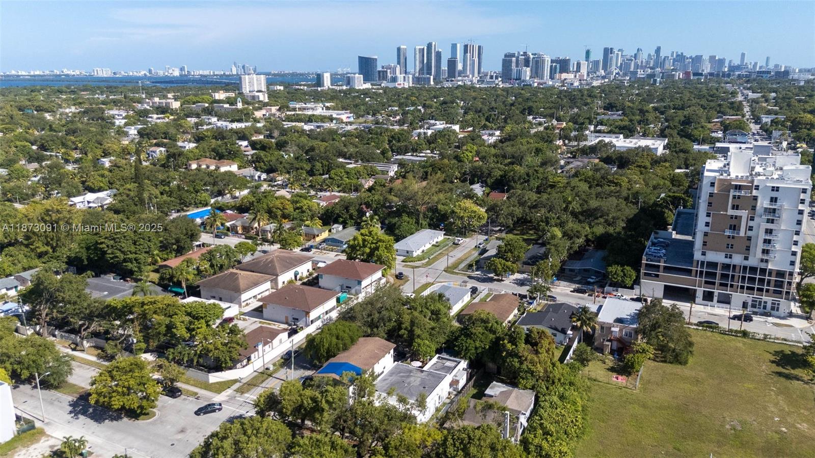 180 Northwest 59th Street Miami, FL 33127 - Photo 22 of 23 an aerial view of city and lake