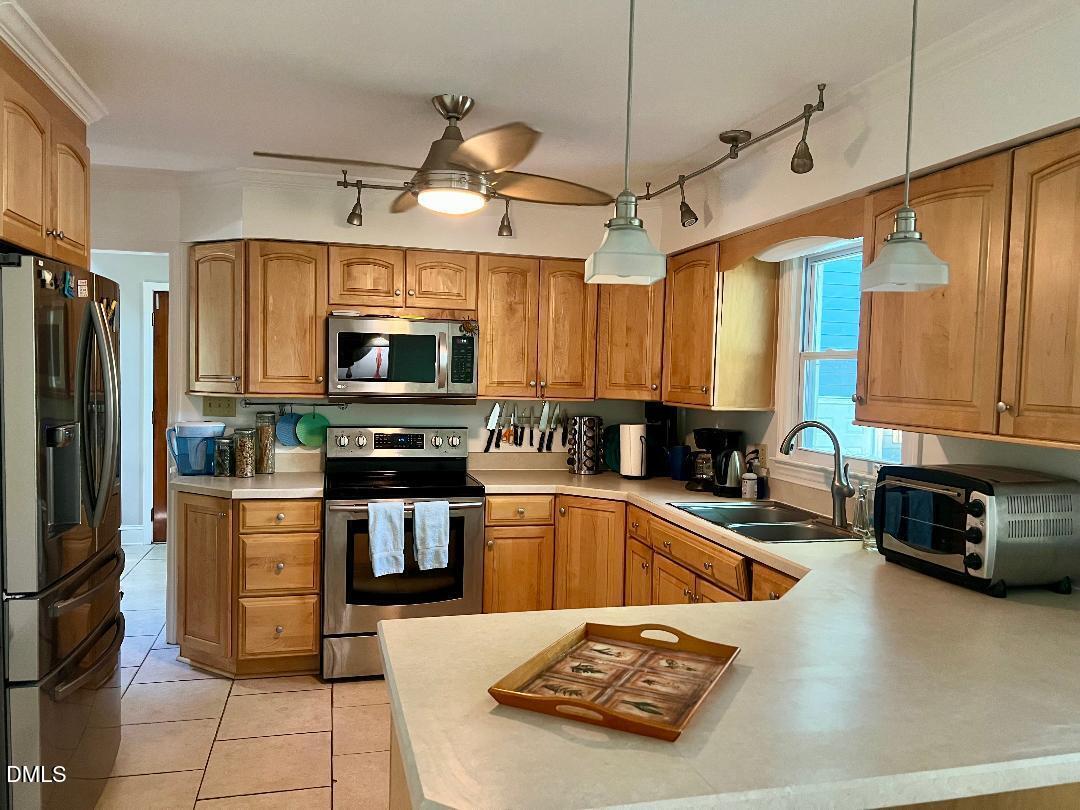 8605 Brookdale Drive Raleigh, NC 27613 - Photo 6 of 36