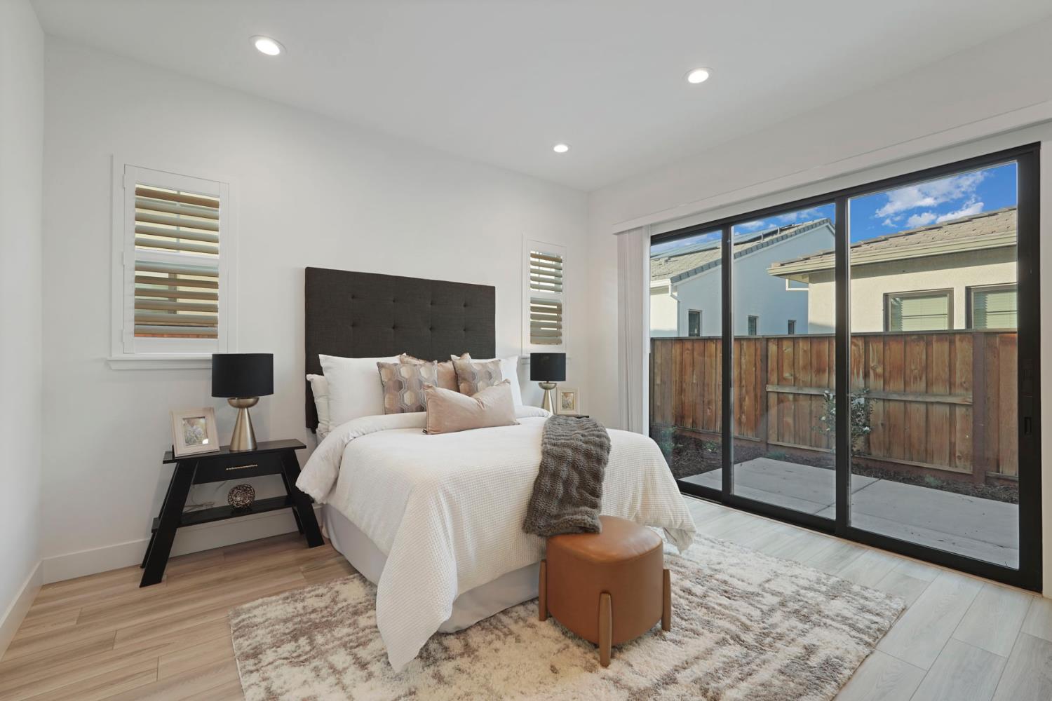 1839 Snowflower Place Tracy, CA 95377 - Photo 14 of 53 a bed room with a bed and a chair