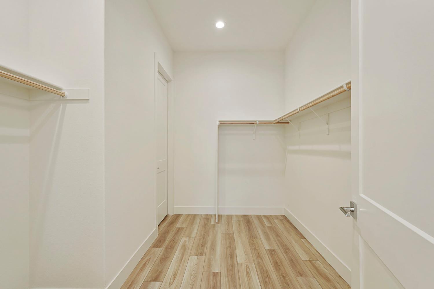 1839 Snowflower Place Tracy, CA 95377 - Photo 19 of 53 a view of a room with wooden floor