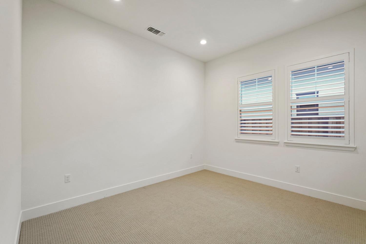 1839 Snowflower Place Tracy, CA 95377 - Photo 21 of 53 an empty room with windows