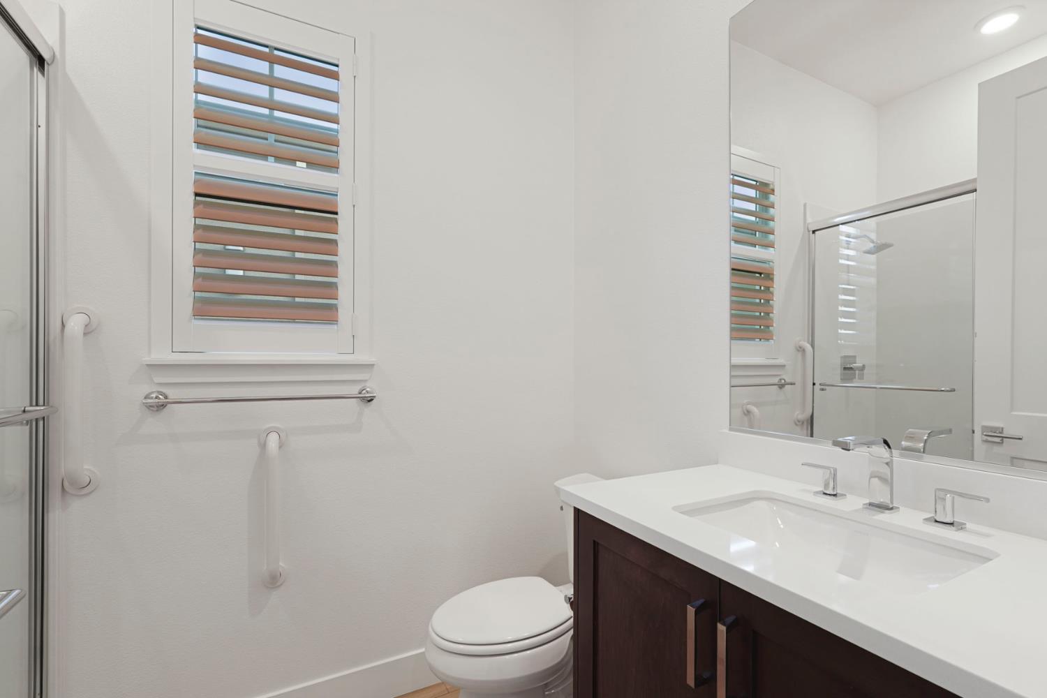 1839 Snowflower Place Tracy, CA 95377 - Photo 23 of 53 a bathroom with a sink a toilet and shower