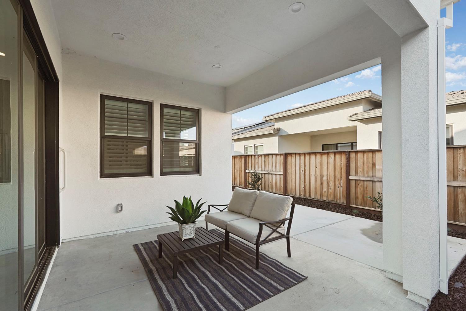 1839 Snowflower Place Tracy, CA 95377 - Photo 26 of 53 a living room with furniture and a window