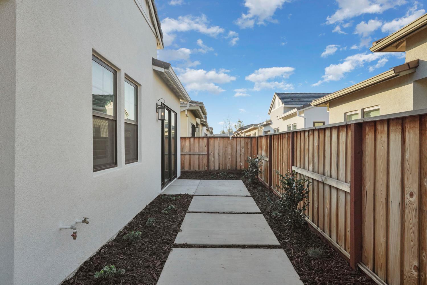 1839 Snowflower Place Tracy, CA 95377 - Photo 29 of 53 a view of a pathway with a balcony