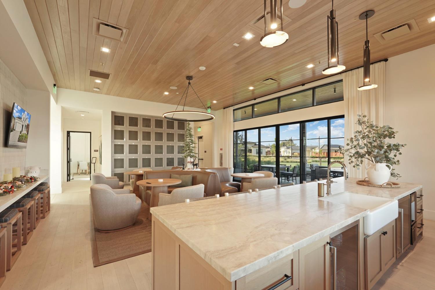 1839 Snowflower Place Tracy, CA 95377 - Photo 38 of 53 a large kitchen with kitchen island a large window in it