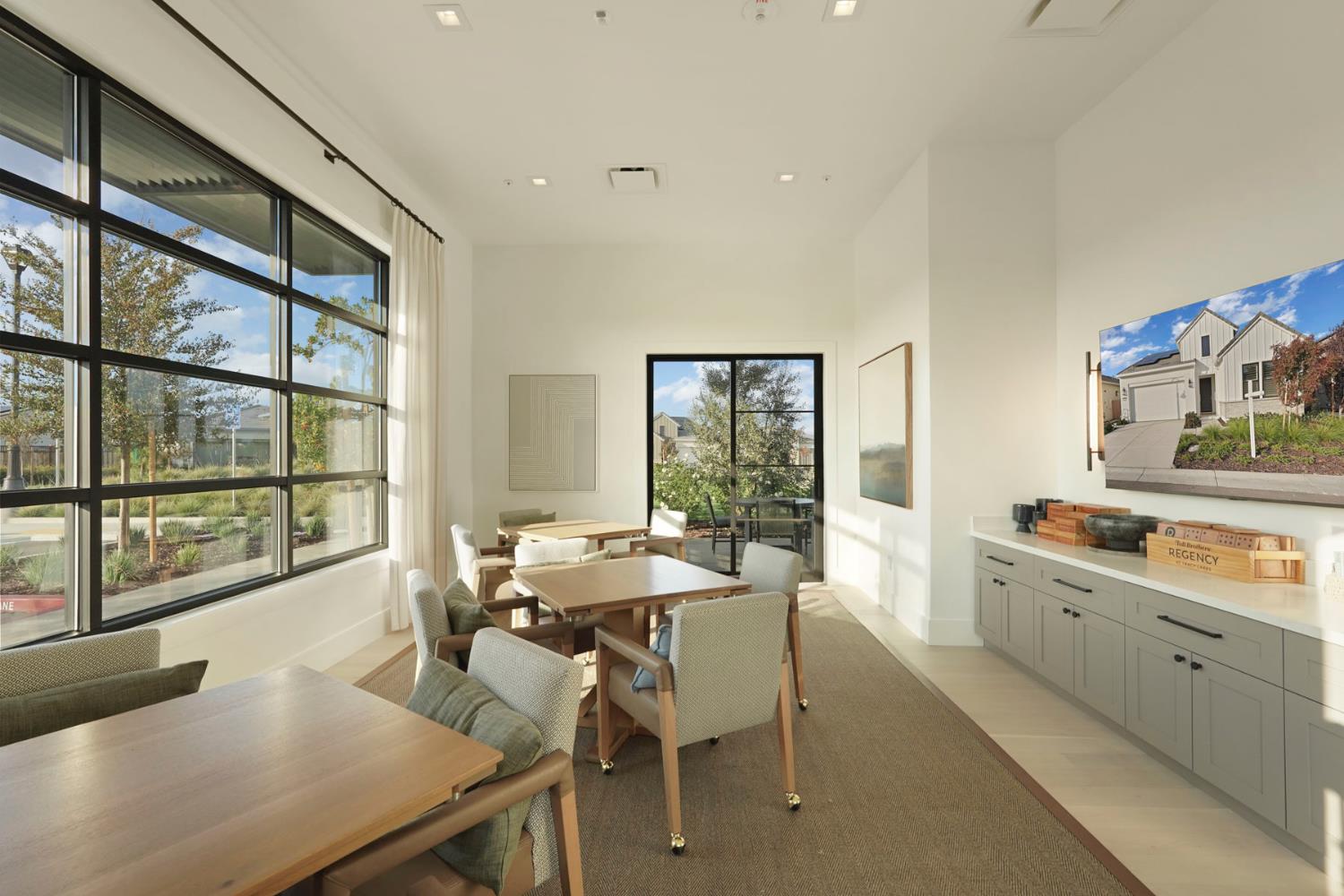 1839 Snowflower Place Tracy, CA 95377 - Photo 39 of 53 a view of a dining room with furniture a chandelier and wooden floor