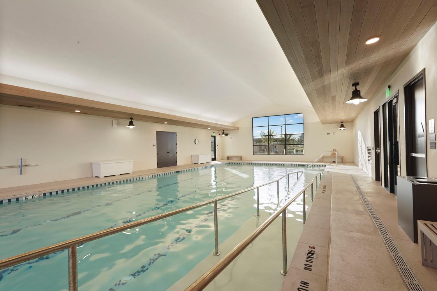 1839 Snowflower Place Tracy, CA 95377 - Photo 41 of 53 a view of a kitchen with kitchen island a large window appliances and cabinets