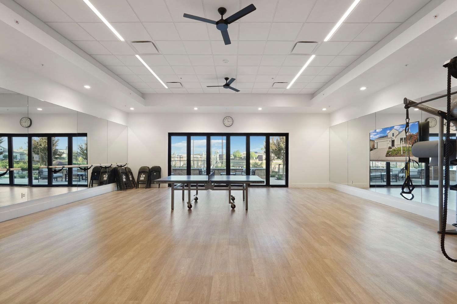1839 Snowflower Place Tracy, CA 95377 - Photo 42 of 53 a view of a room with lots of wooden furniture and windows