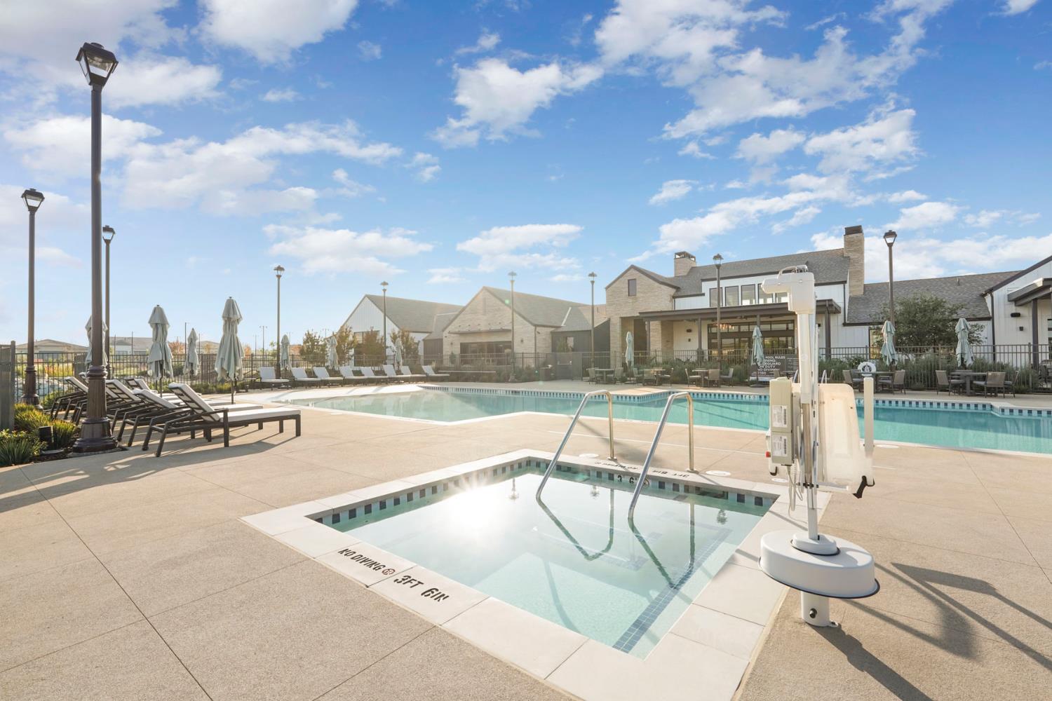 1839 Snowflower Place Tracy, CA 95377 - Photo 45 of 53 a view of a swimming pool with a lounge chairs
