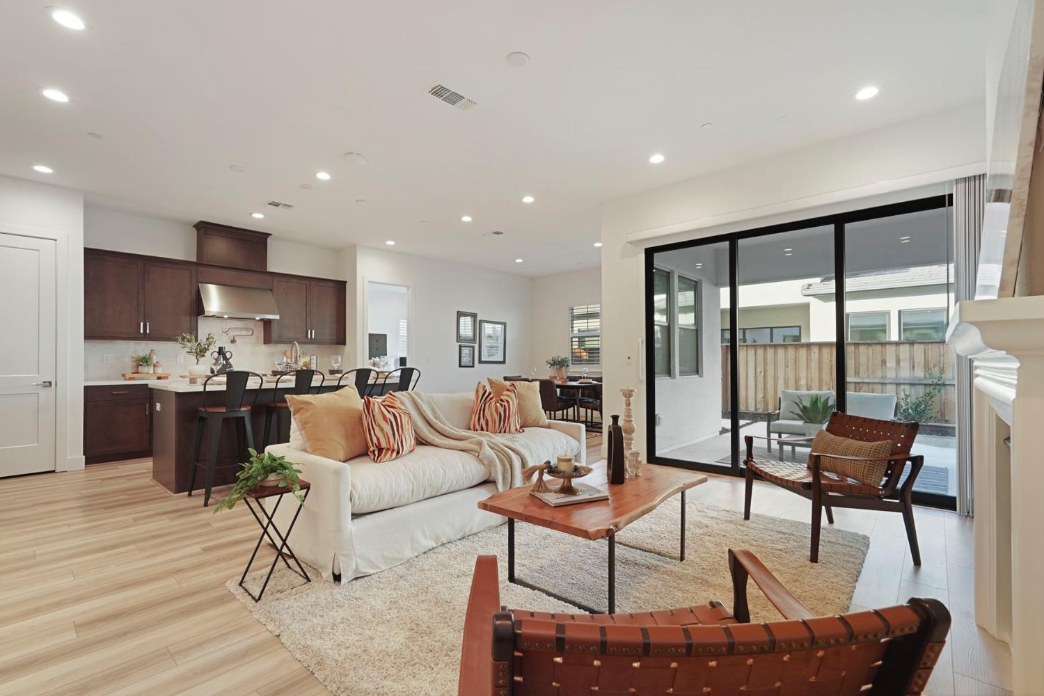 1839 Snowflower Place Tracy, CA 95377 - Photo 7 of 53 a living room with furniture and a large window