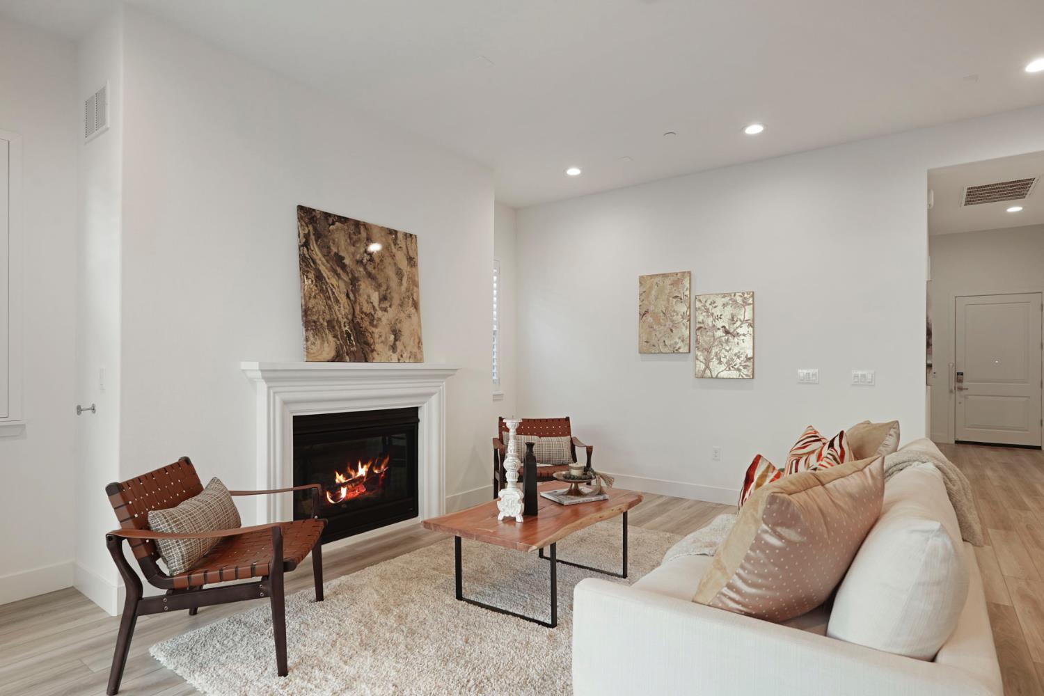 1839 Snowflower Place Tracy, CA 95377 - Photo 8 of 53 a living room with furniture and a fireplace