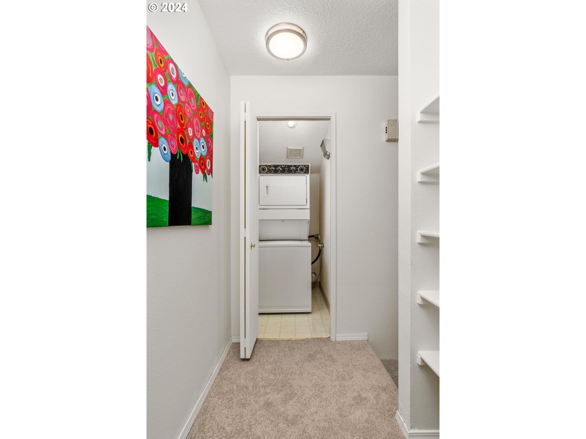 6223 Meridian Circle West Linn, OR 97068 - Photo 27 of 45 a view of a hallway with dining room and stairs