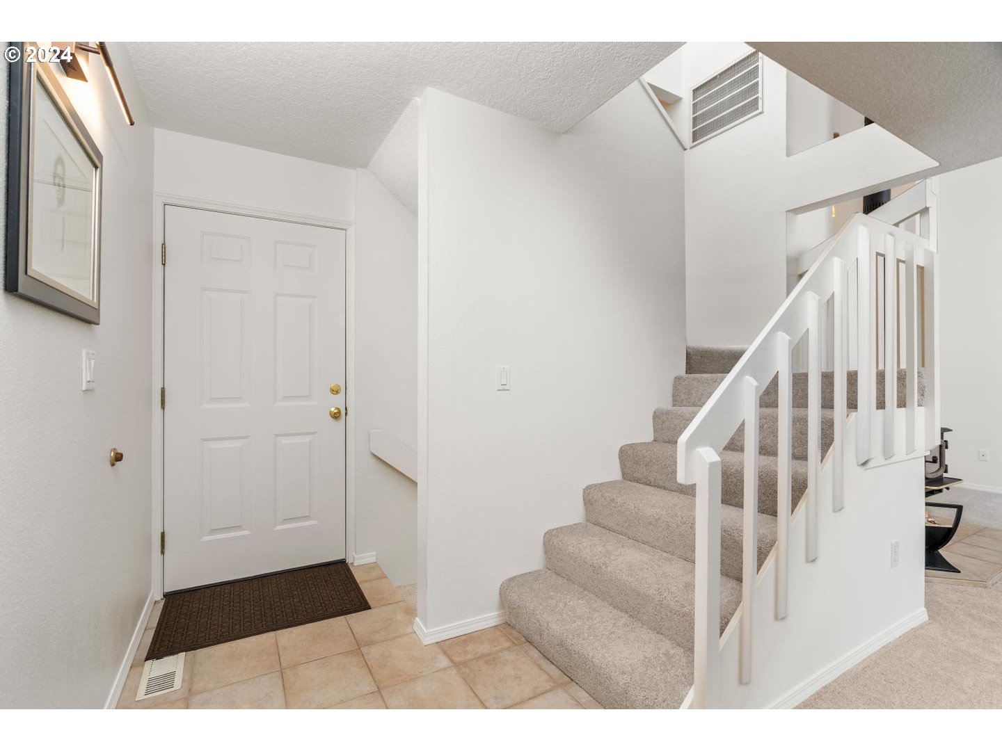 6223 Meridian Circle West Linn, OR 97068 - Photo 6 of 45 a view of an entryway with wooden floor