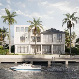 a front view of a house with a garden and swimming pool