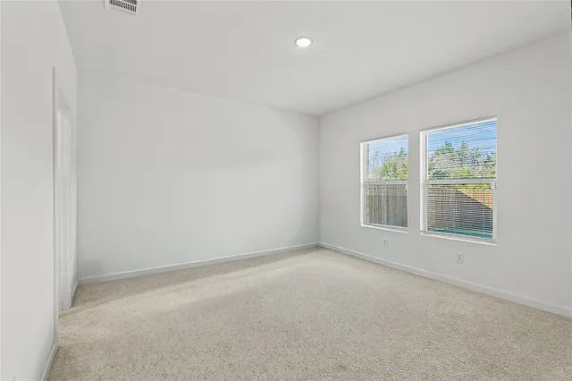 a room with a table and a window