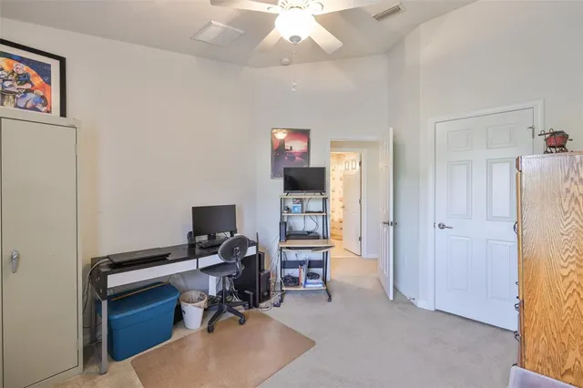 a workspace with furniture and a window